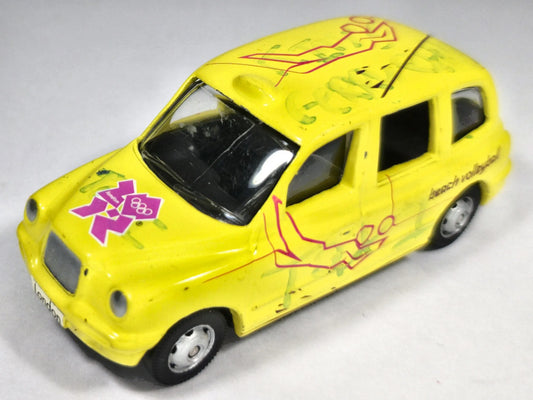 LONDON TAXIS TX1 TAX1 Corgi 2007 Żółty 1:52 – zdjęcie 2