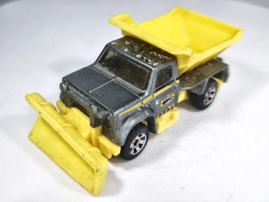 Snow Thrasher Matchbox 2014 MBX Construction 1:64 Wywrotka Luzak Żółty – zdjęcie 2
