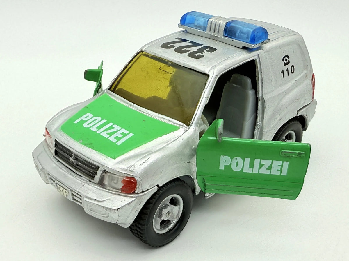 Mitsubishi Pajero POLICE, Suv Policyjny, resoraki, die cast, 1:43 – zdjęcie 10