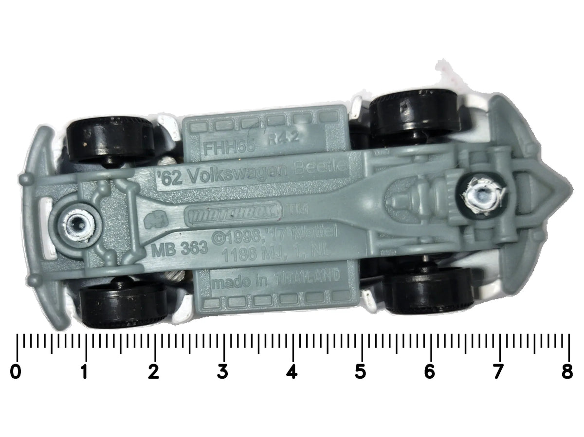 '62 Volkswagen Beetle Mainline Policja Matchbox 1998 Biały 1:55 – zdjęcie 7
