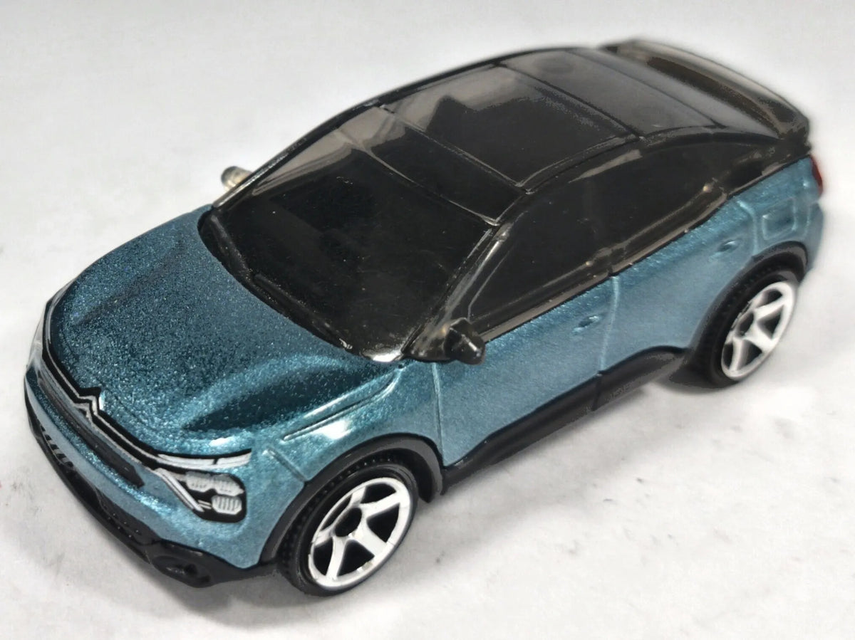 2023 Citroën ë-C4 Matchbox 2023 1:64 Turkusowy Miejski – zdjęcie 2