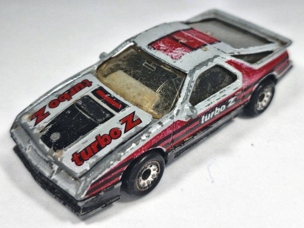 1984 DODGE DAYTONA TURBO Z, Matchbox, Die cast, Srebrny, 1:64, Resoraki – zdjęcie 2