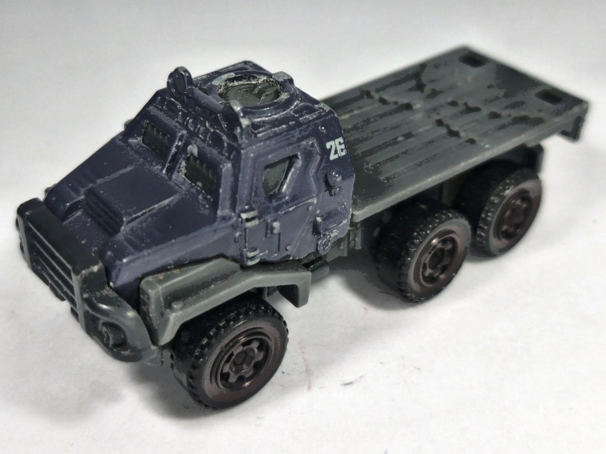 Ciężarówka Armored Action Transporter Wojsko Matchbox 2017 Granatowy 1:64 – zdjęcie 2