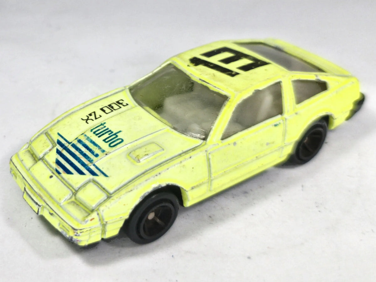 Nissan 300ZX Turbo Yatming 1:64 turbo #13 Luzak Żółty Jaskrawy – zdjęcie 2