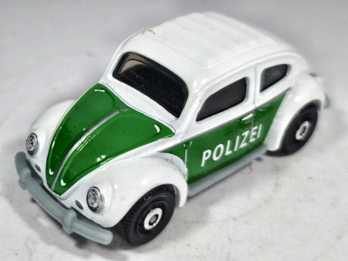 '62 Volkswagen Beetle Mainline Policja Matchbox 1998 Biały 1:55 – zdjęcie 2