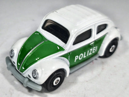 '62 Volkswagen Beetle Mainline Policja Matchbox 1998 Biały 1:55 – zdjęcie 2