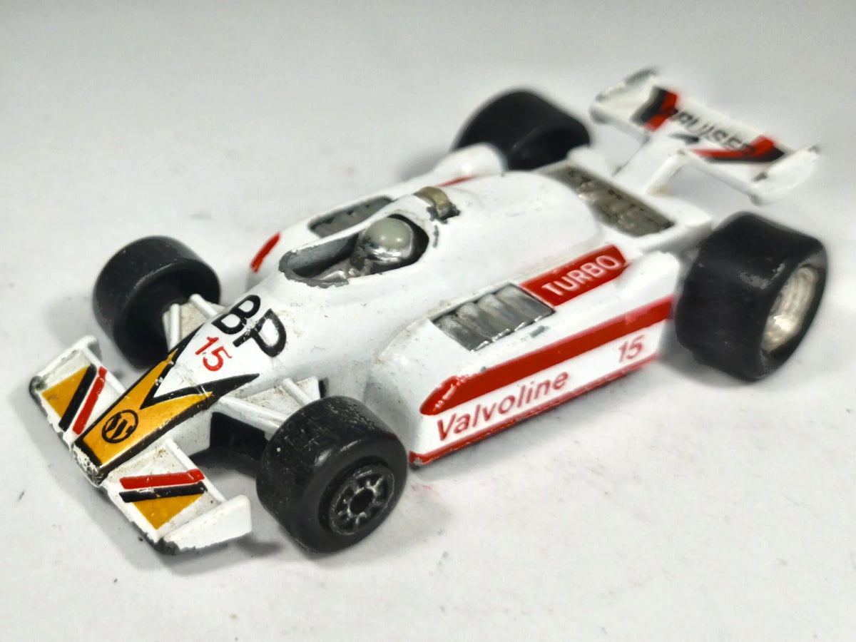 Formuła 1 MC Toy Juniors 1:64 Bolid F1 Valvoline BP Turbo / Bruiser Luzak – zdjęcie 2