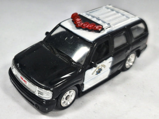 GMC Yukon Denali Welly 2001 1:60 Luzak Czarny Policja – zdjęcie 2