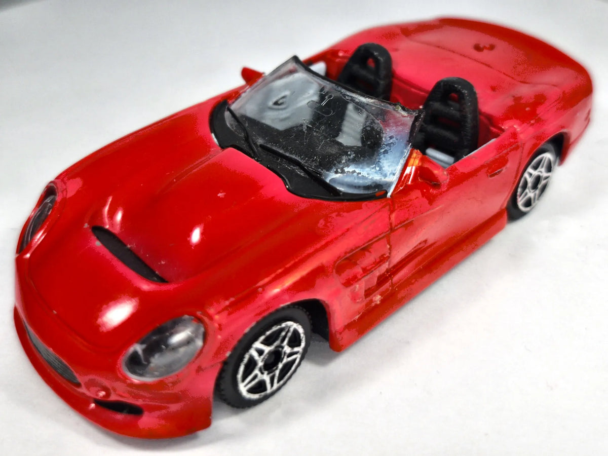SHELBY SERIES 1 CABRIO Bburago Made in Italy Czerwony 1:43 – zdjęcie 2