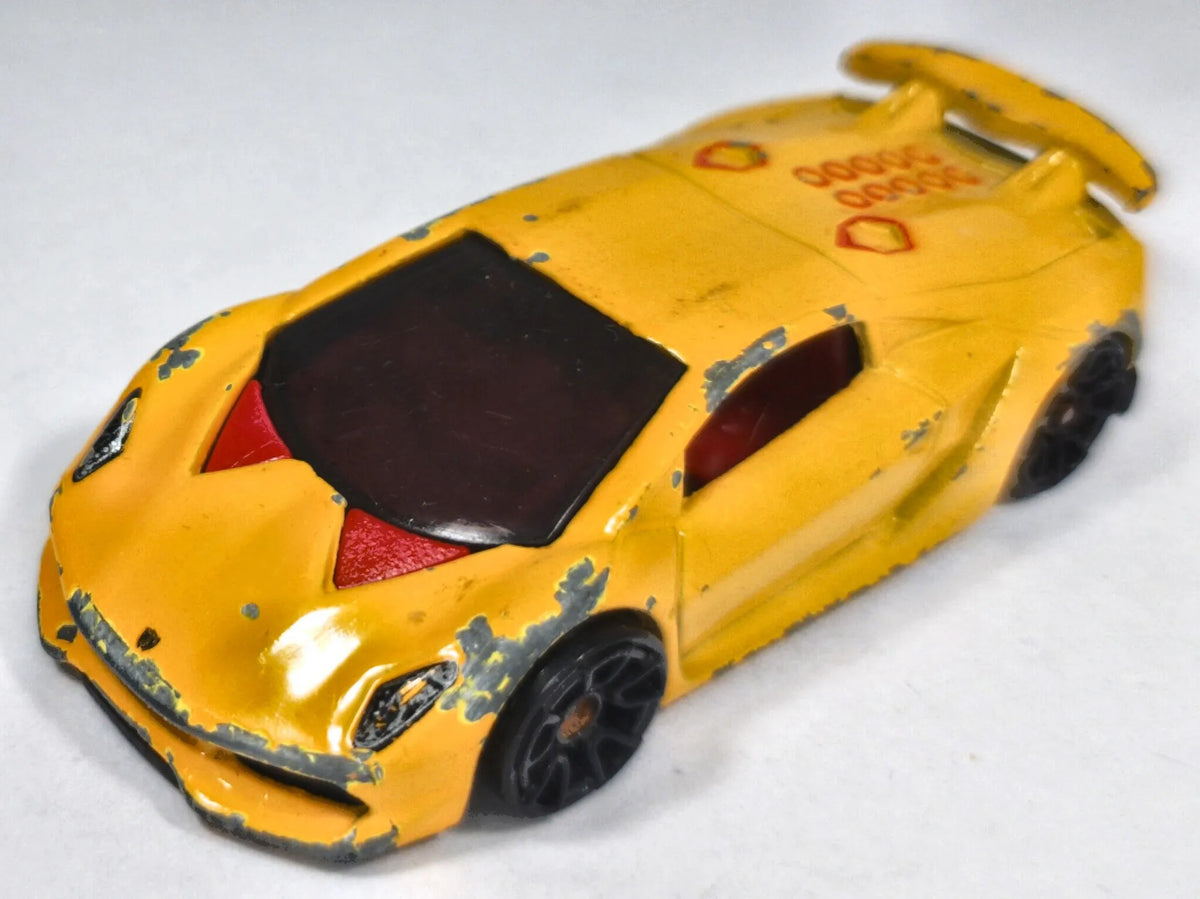 Lamborghini Sesto Elemento Hot Wheels 2013 1:64 00 Luzak Żółty – zdjęcie 2