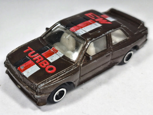 BMW 320i Turbo Rally Pioneer 1:64 Luzak Brązowy – zdjęcie 2