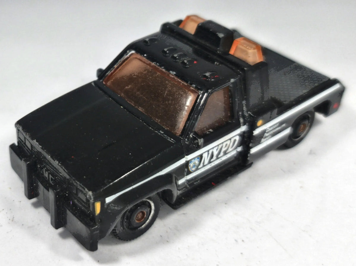 GMC Wrecker Matchbox 1987 Matchbox Series 1:64 Pomoc drogowa NYPD Luzak – zdjęcie 2
