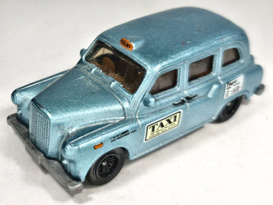 LONDON TAXI Matchbox 2004 Niebieski 1:63 – zdjęcie 2