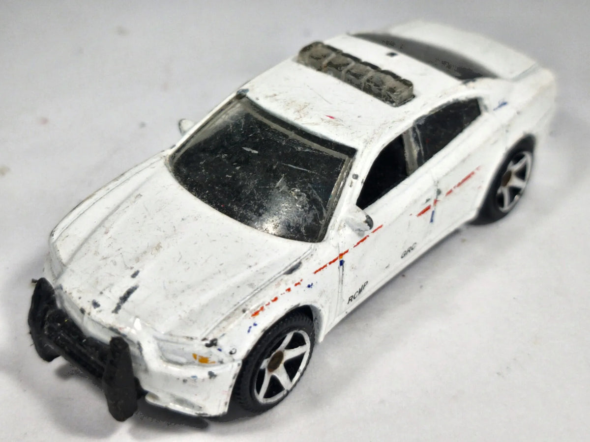 Dodge Charger Pursuit Policja Matchbox 2012 Biały 1:57 – zdjęcie 2