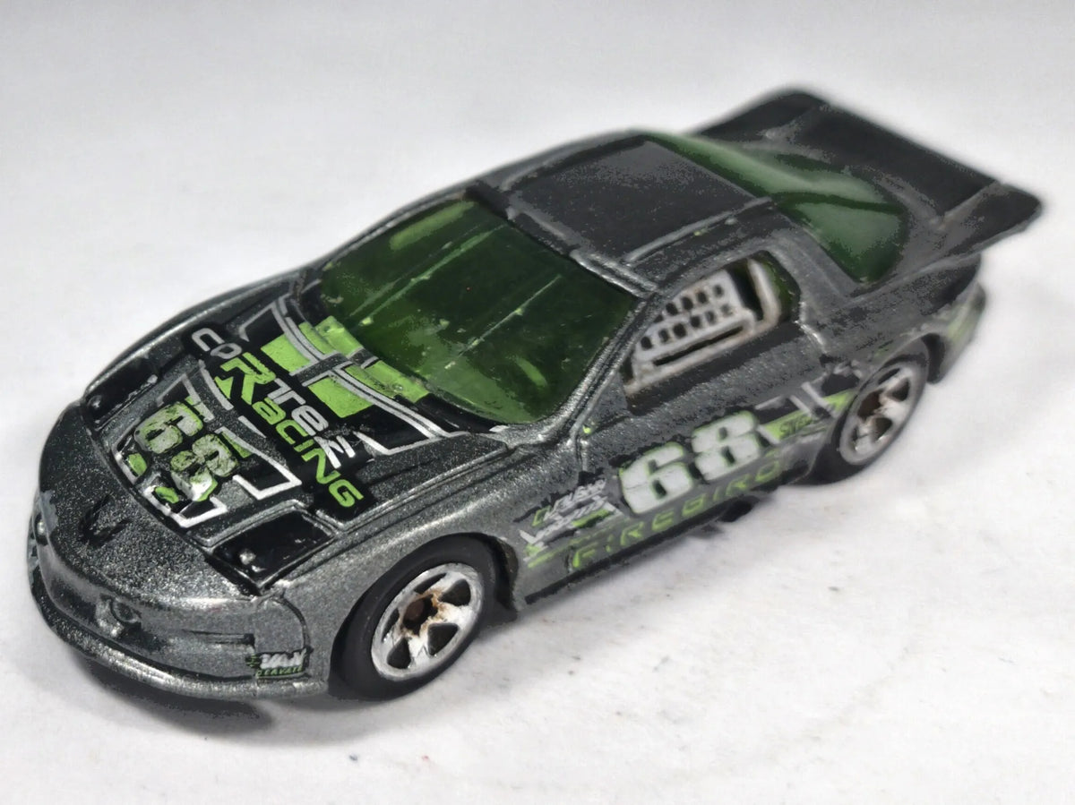 Iroc Firebird Hot Wheels 1999 1:64 68 Luzak Szary – zdjęcie 2