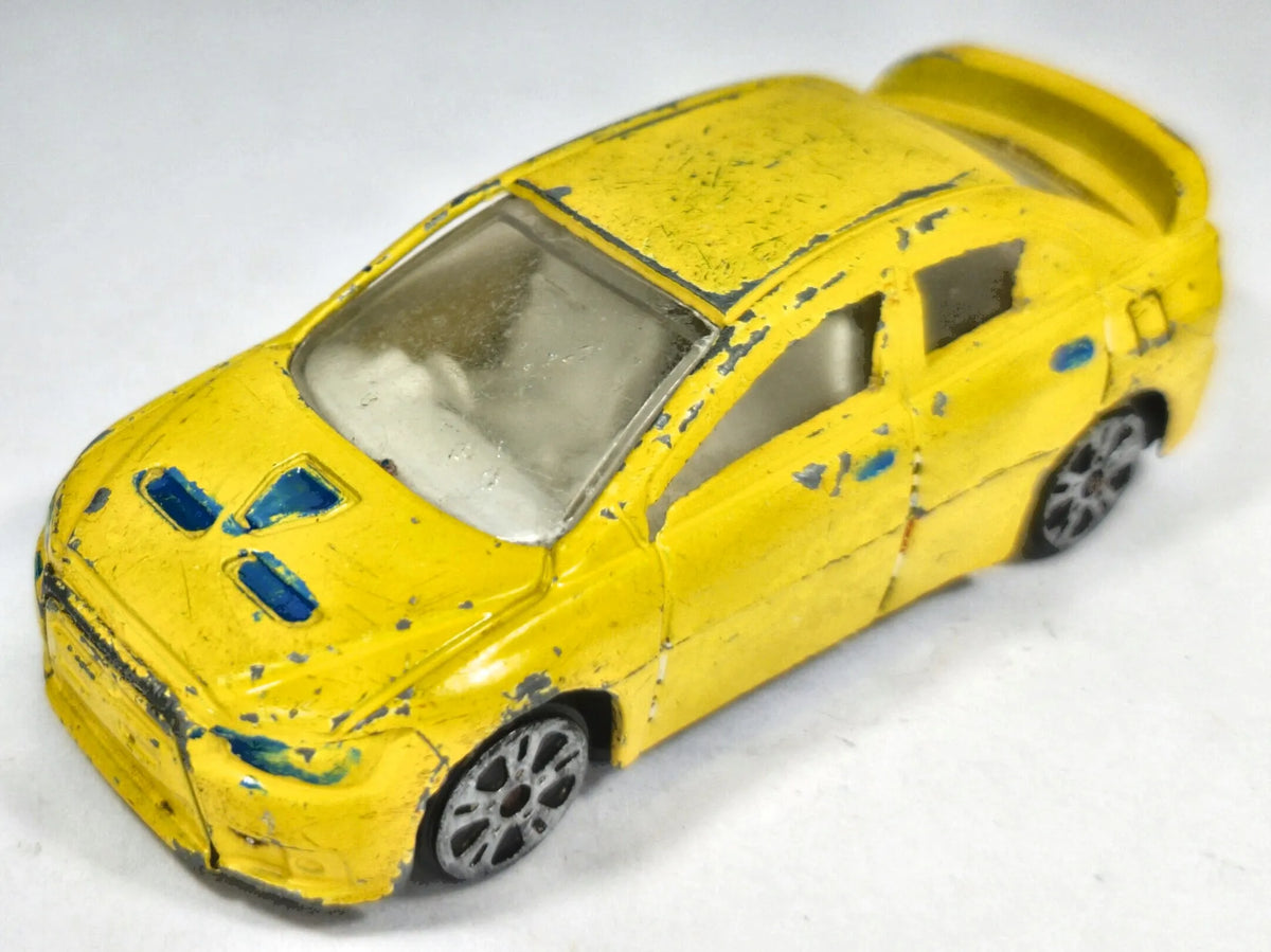 Mitsubishi Lancer Evolution 1:56 Luzak Żółty – zdjęcie 2