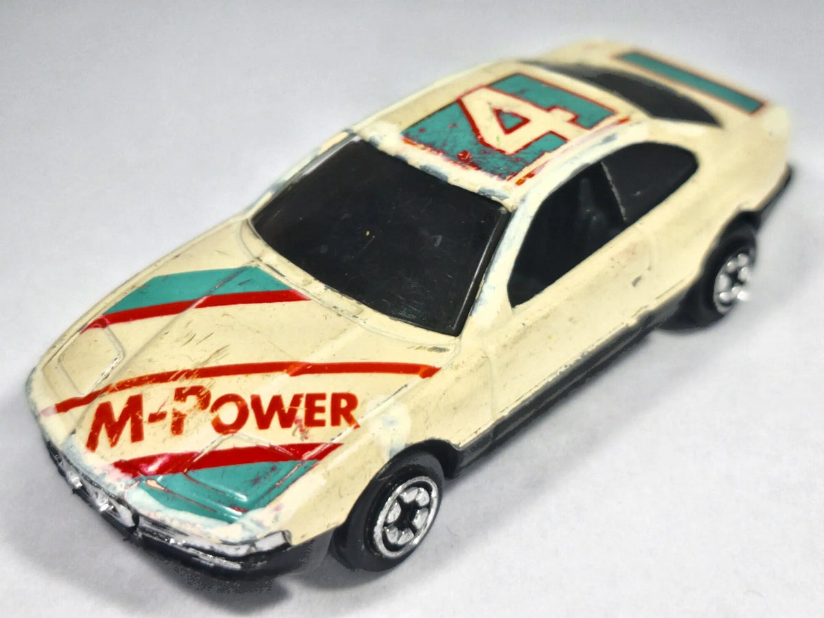 Jak BMW 850i Seria E31, M-Power #4, Die cast NO.804, Kremowy 1:64, Resoraki – zdjęcie 2
