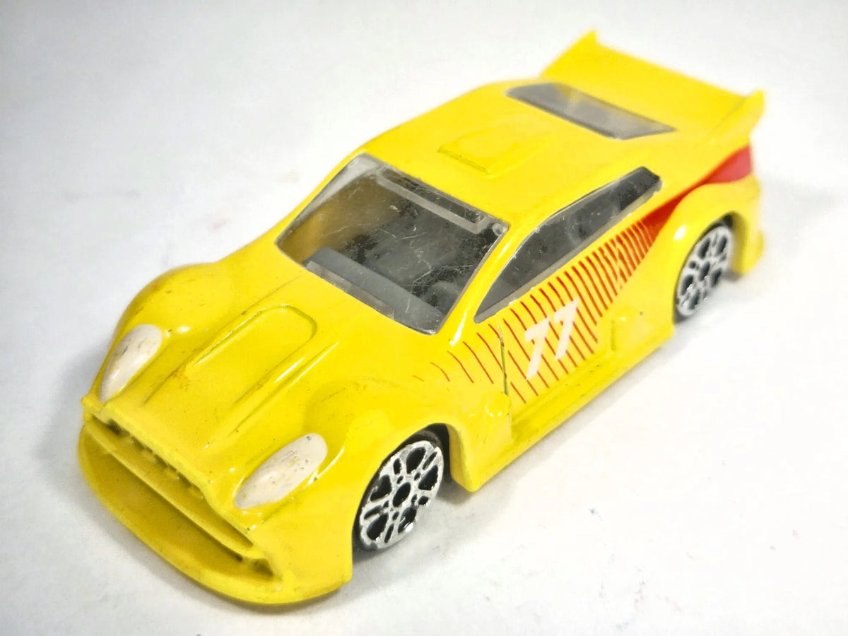 FUTURYSTYCZNY SAMOCHÓD WYŚCIGOWY Delta-Sport Made in Germany Żółty 77, 1:64 – zdjęcie 2