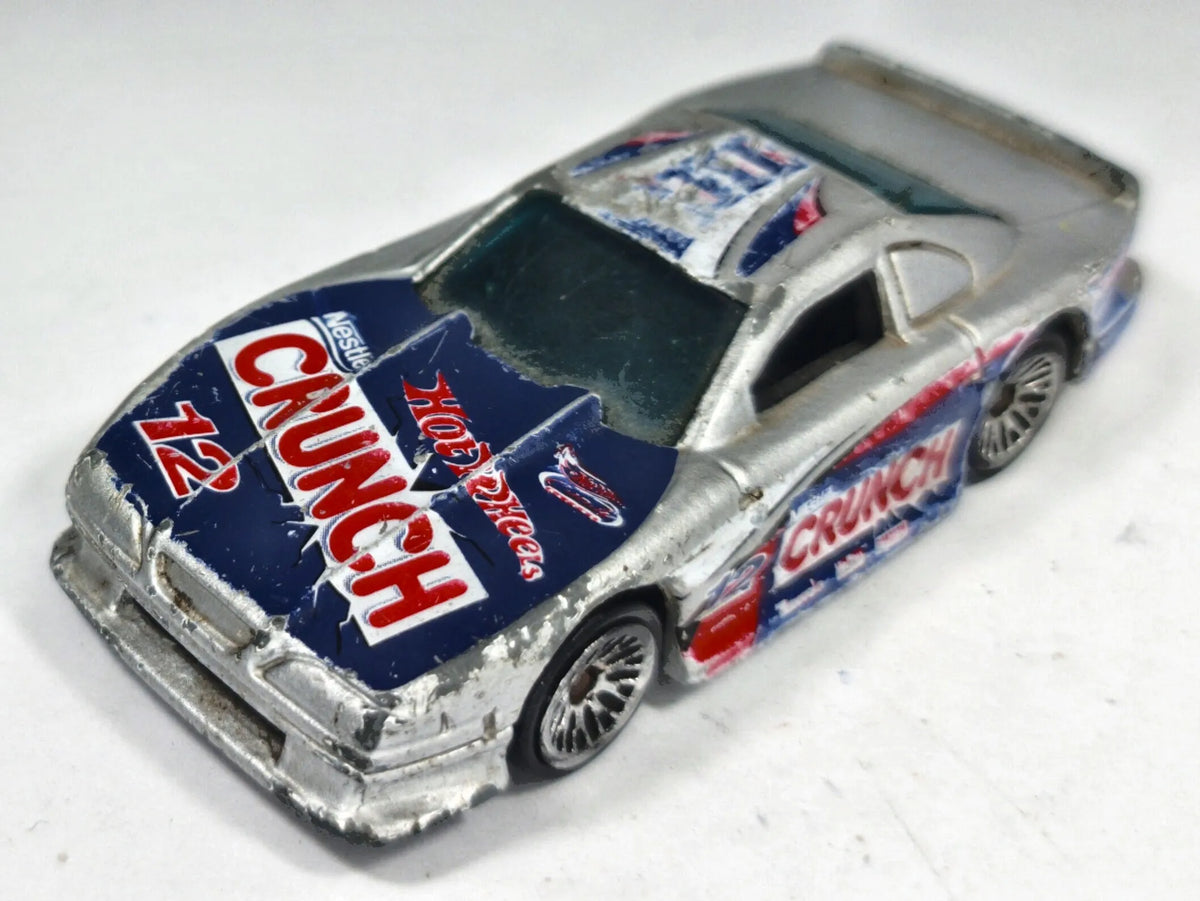 Ford Mustang Cobra Hot Wheels 1997 1:64 Nestlé Crunch Luzak Srebrny – zdjęcie 2