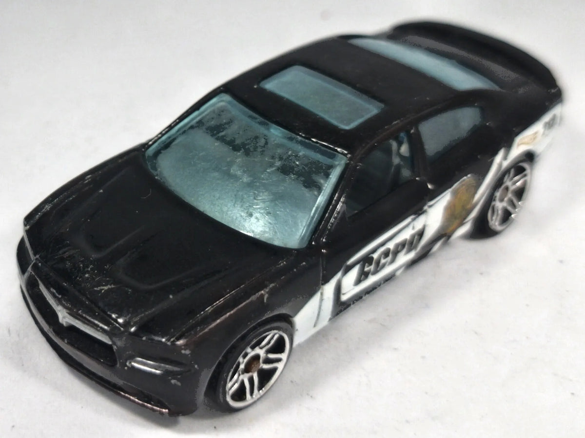 Dodge Charger R/T Hot Wheels 2011 1:64 TO PROTECT AND SERVE Luzak Policja – zdjęcie 2