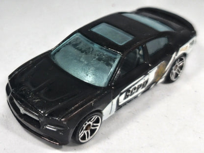 Dodge Charger R/T Hot Wheels 2011 1:64 TO PROTECT AND SERVE Luzak Policja – zdjęcie 2