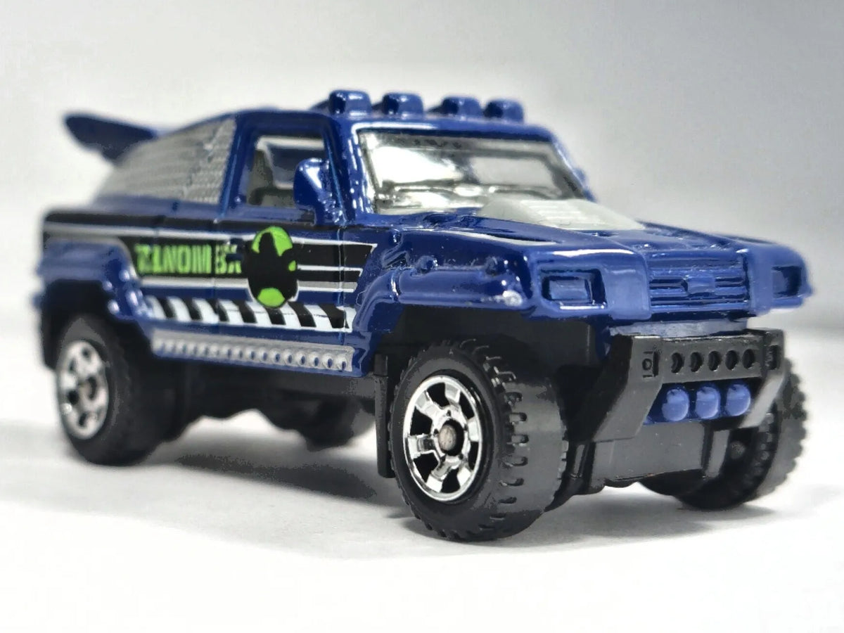 RIDGE RAIDER, DINOM8X, Matchbox 2006 Die cast M8716 Niebieski 1:64 Resoraki – zdjęcie 9