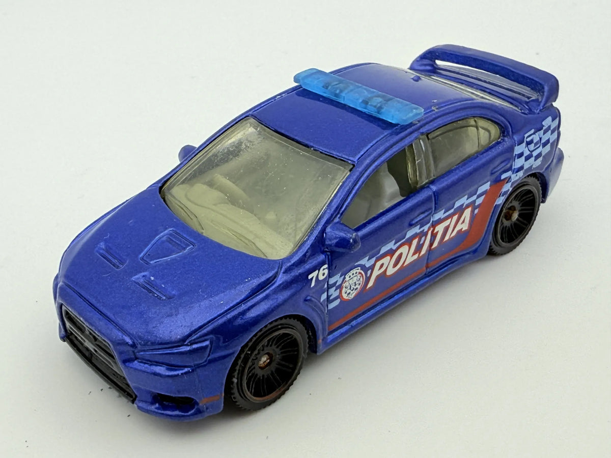 Mitsubishi Lancer Evolution X Police 2010, Matchbox, Resoraki Die cast 1:64 – zdjęcie 8