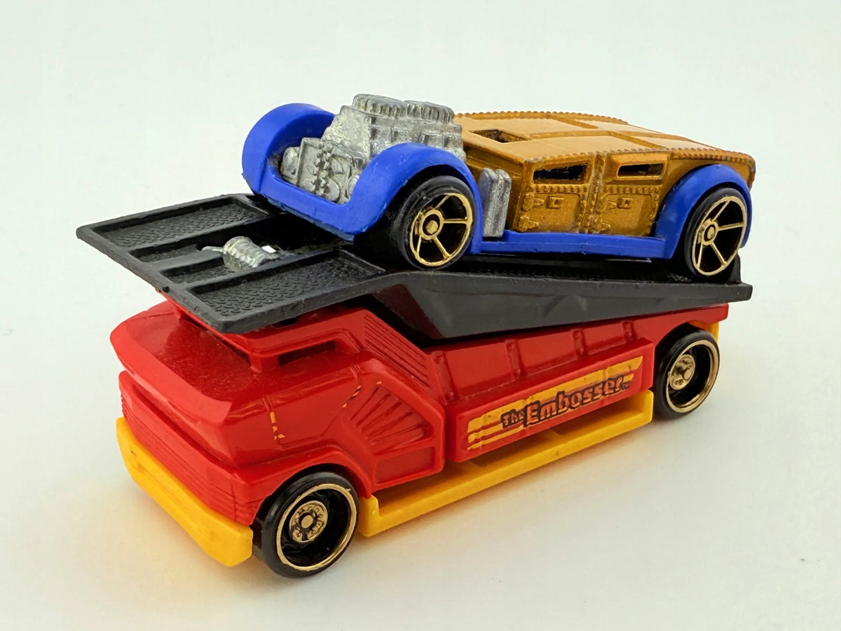 The Embosser Hot Wheels 2010 Żółty, 1:64 – zdjęcie 11