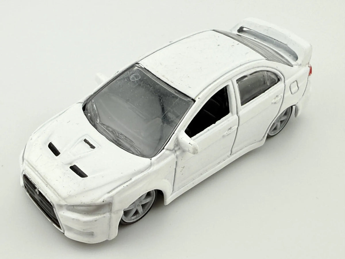 MITSUBISHI LANCER EVOLUTION, Bburago, Die cast 11524, Biały, 1:64, Resoraki – zdjęcie 8