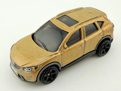 '16 Mazda CX-5 Matchbox 2017 Złoty 1:64 – zdjęcie 10