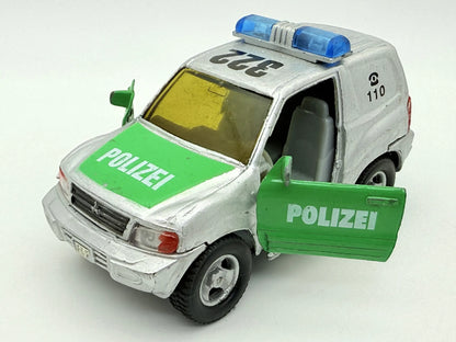 Mitsubishi Pajero POLICE, Suv Policyjny, resoraki, die cast, 1:43 – zdjęcie 10