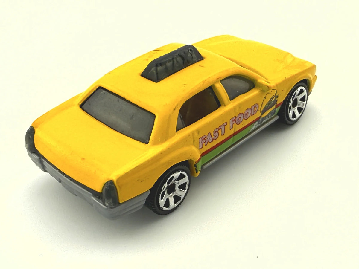 Taxi Cab Matchbox 2002 Żółty 1:64 – zdjęcie 6