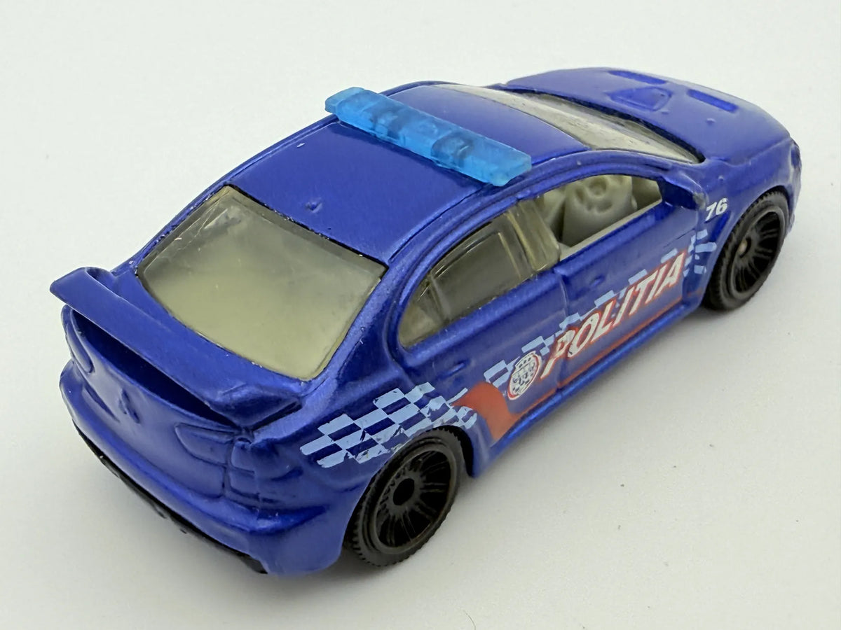 Mitsubishi Lancer Evolution X Police 2010, Matchbox, Resoraki Die cast 1:64 – zdjęcie 2