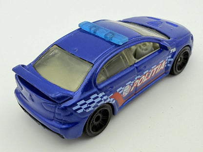 Mitsubishi Lancer Evolution X Police 2010, Matchbox, Resoraki Die cast 1:64 – zdjęcie 2