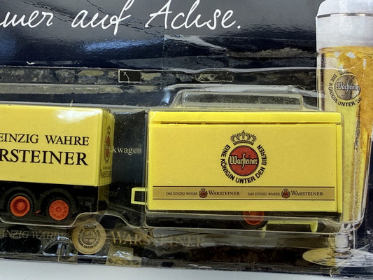 Mercedes-Benz Atego 1:87 Ciężarówka Promocyjna WARSTEINER Blister Żółty – zdjęcie 2