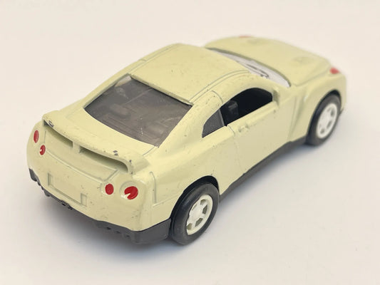 NISSAN GT-R, Inspiracja Autka Disney, Resoraki, Die cast, Kremowy 1:55 – zdjęcie 2