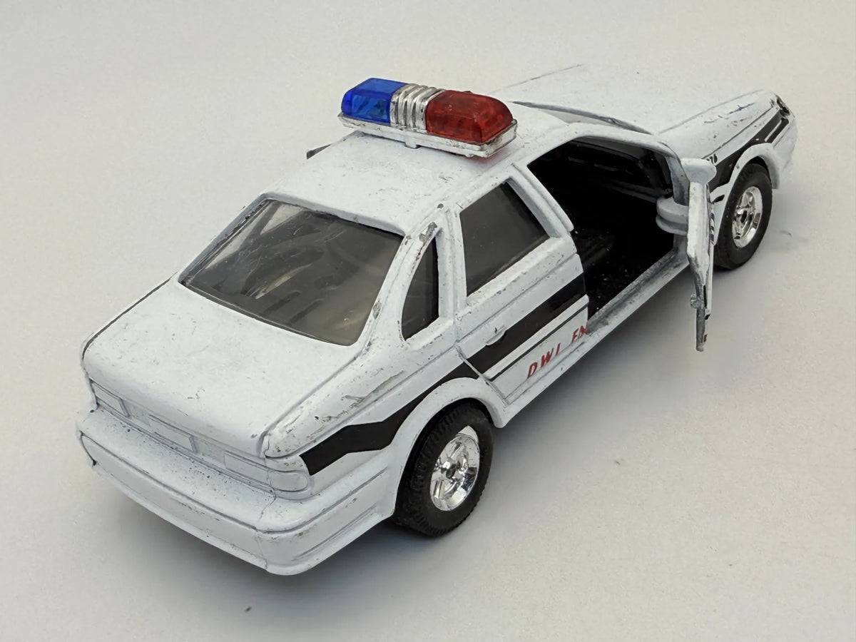 SHOWCASTS FORD TAURUS POLICE POLICJA Welly Biały 1:30 – zdjęcie 2