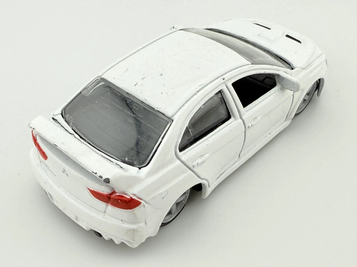 MITSUBISHI LANCER EVOLUTION, Bburago, Die cast 11524, Biały, 1:64, Resoraki – zdjęcie 2