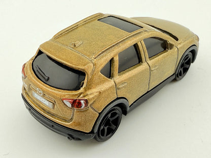 '16 Mazda CX-5 Matchbox 2017 Złoty 1:64 – zdjęcie 2