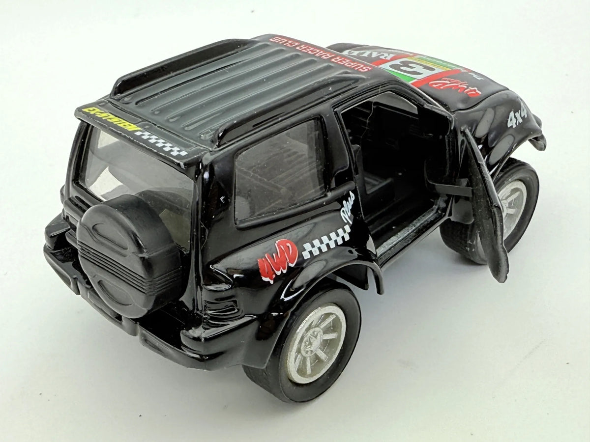 Jak Mitsubishi Pajero Rally 4X4 Czarny 1:43 – zdjęcie 2