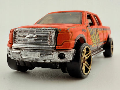 2009 Ford F-150 Mainline Hot Wheels 2012 Pomarańczowy 1:64 – zdjęcie 3