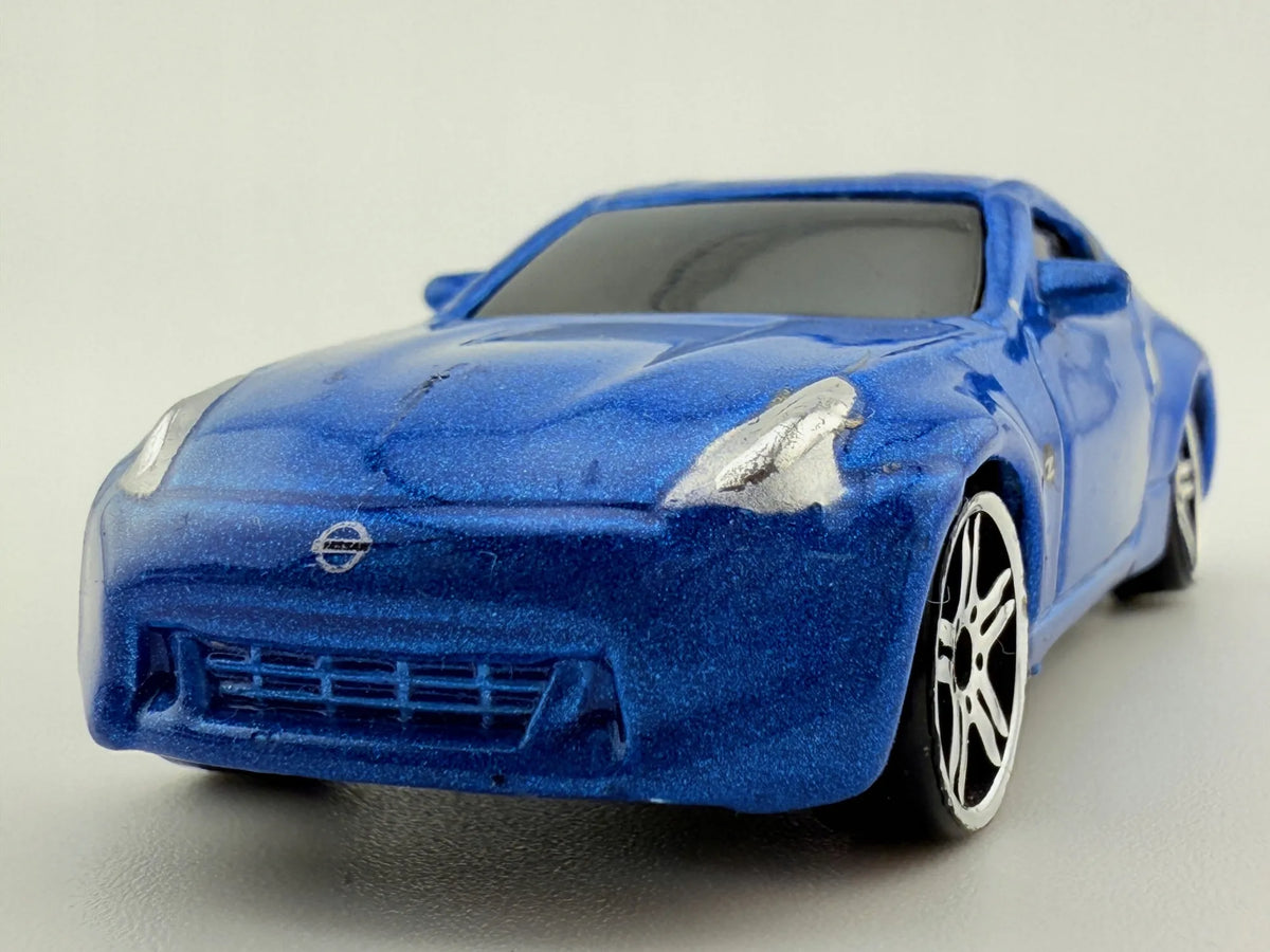 2009 Nissan 370Z Maisto 2009 Niebieski 1:64 – zdjęcie 3