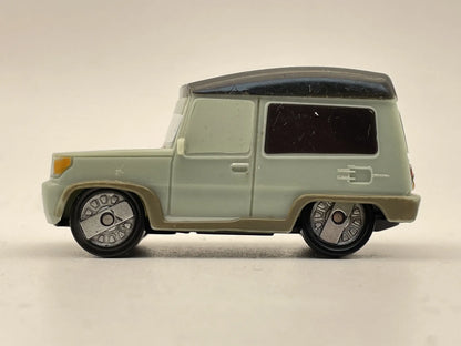 Miles Axlerod z filmu Auta 2 Disney Pixar, Die cast Zielony, 1:64, Resoraki – zdjęcie 3