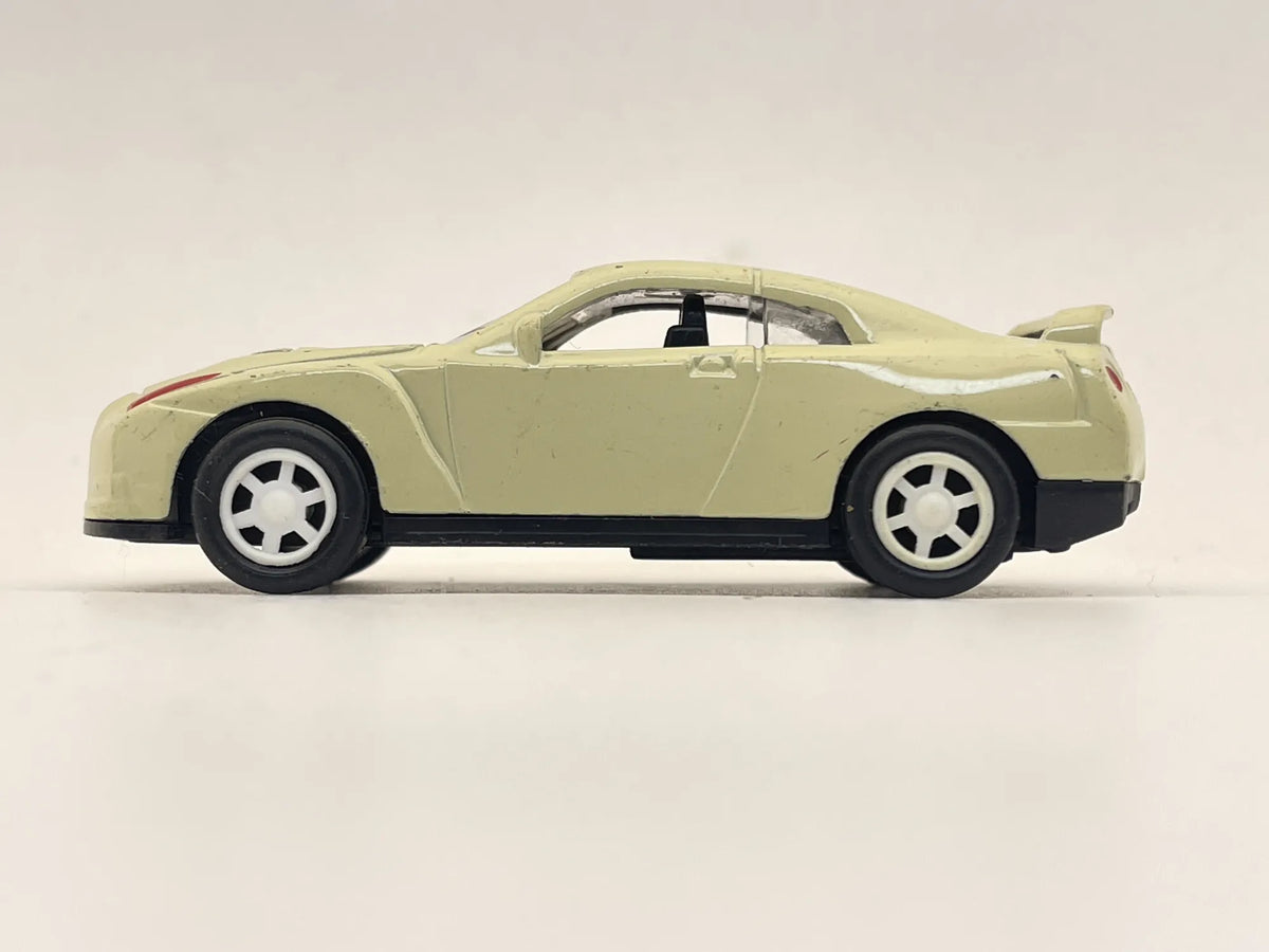 NISSAN GT-R, Inspiracja Autka Disney, Resoraki, Die cast, Kremowy 1:55 – zdjęcie 3