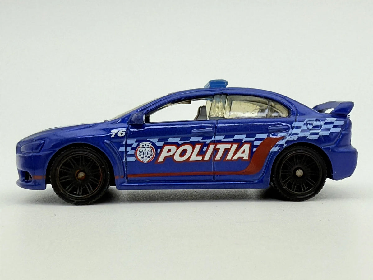 Mitsubishi Lancer Evolution X Police 2010, Matchbox, Resoraki Die cast 1:64 – zdjęcie 3