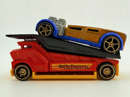 The Embosser Hot Wheels 2010 Żółty, 1:64 – zdjęcie 3