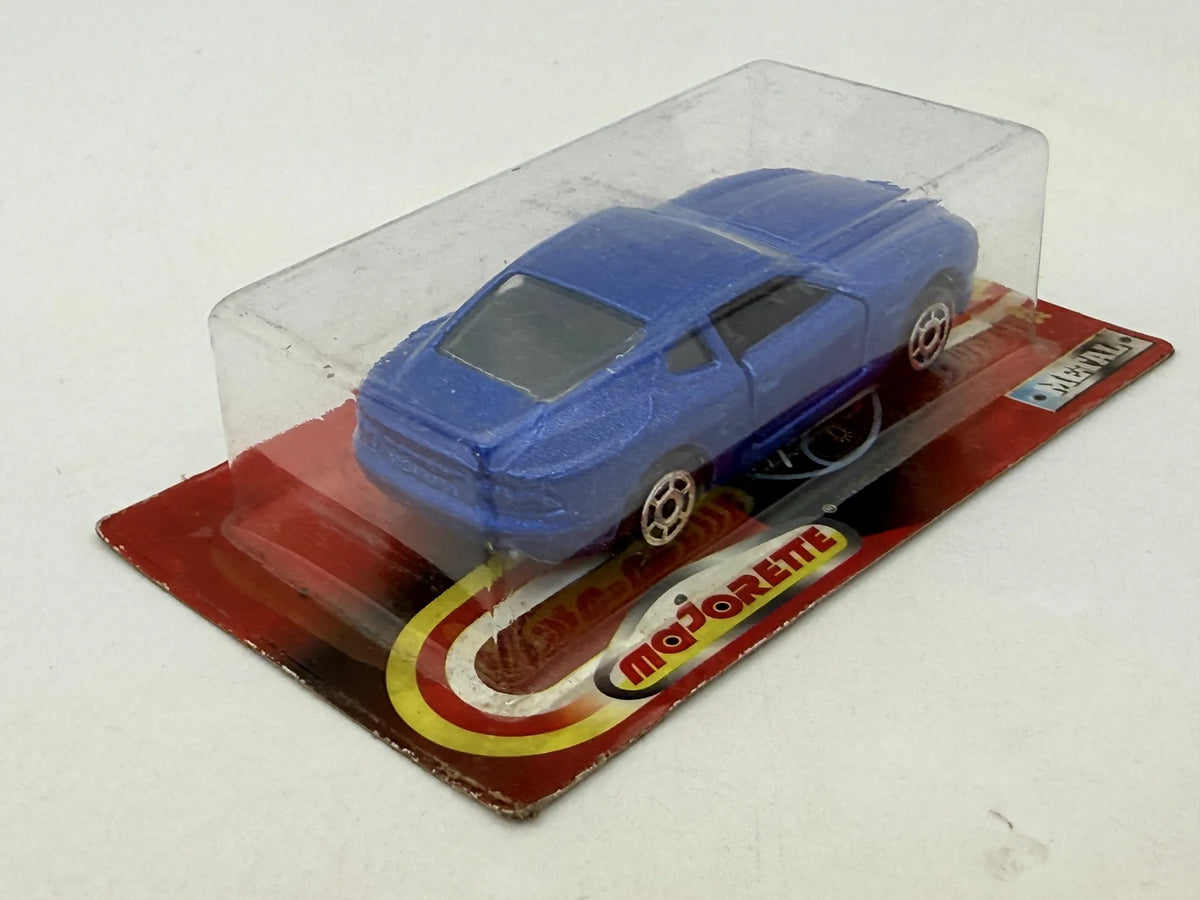 ASTON MARTIN DB7 Welly '90 Niebieski 1:64 – zdjęcie 3