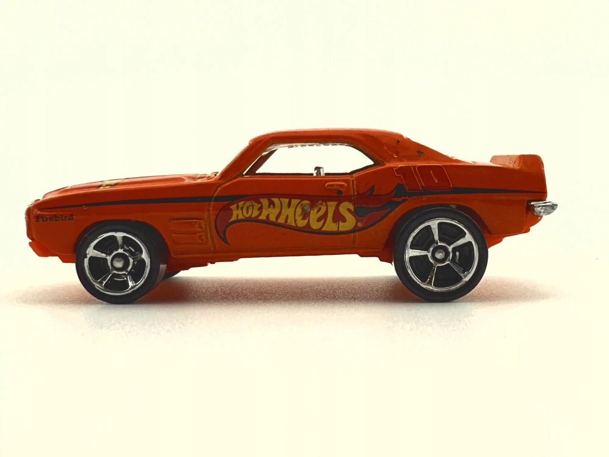 '69 Pontiac Firebird Mystery Models Hot Wheels 2012 Pomarańczowy 1:64 – zdjęcie 3