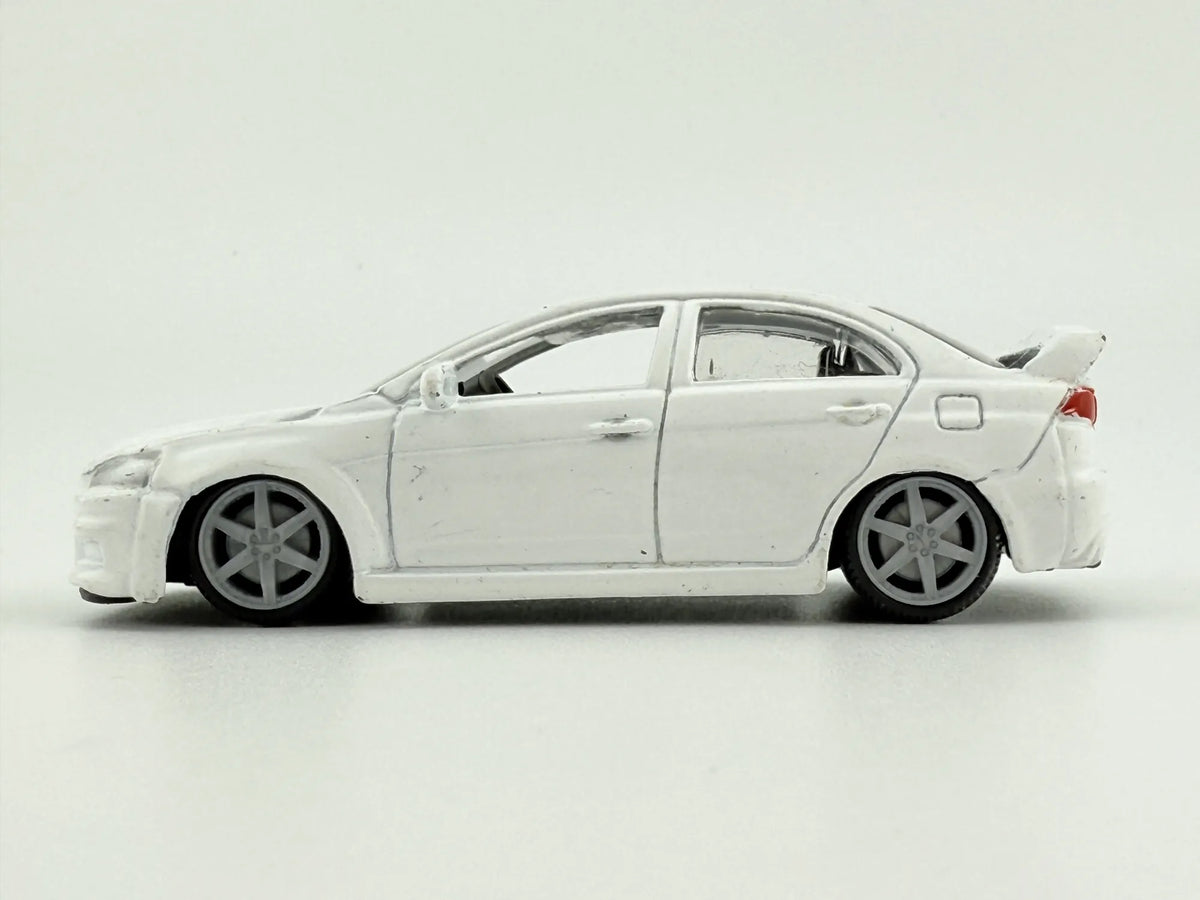 MITSUBISHI LANCER EVOLUTION, Bburago, Die cast 11524, Biały, 1:64, Resoraki – zdjęcie 3