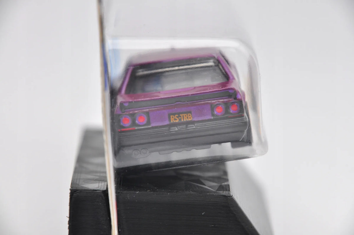 NISSAN SKYLINE RS (KDR30) Hot Wheels 2024 Fioletowy 1:64 – zdjęcie 3
